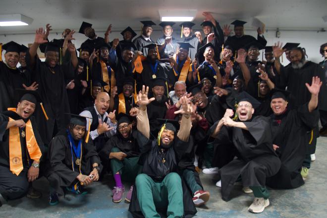 My graduating class celebrating after the ceremony